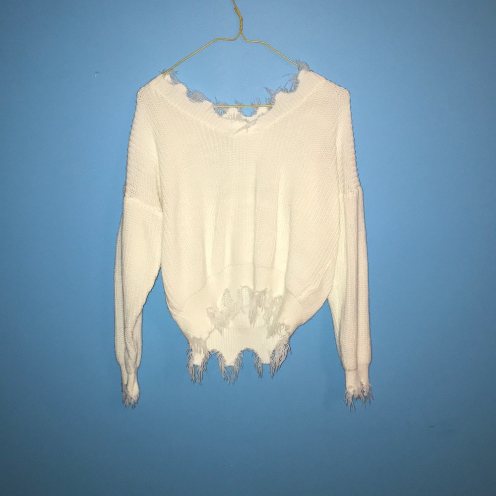 Small white distressed sweater. Barely worn.